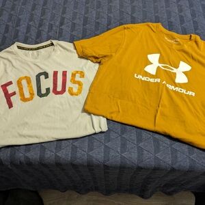 Two medium under armour shirts